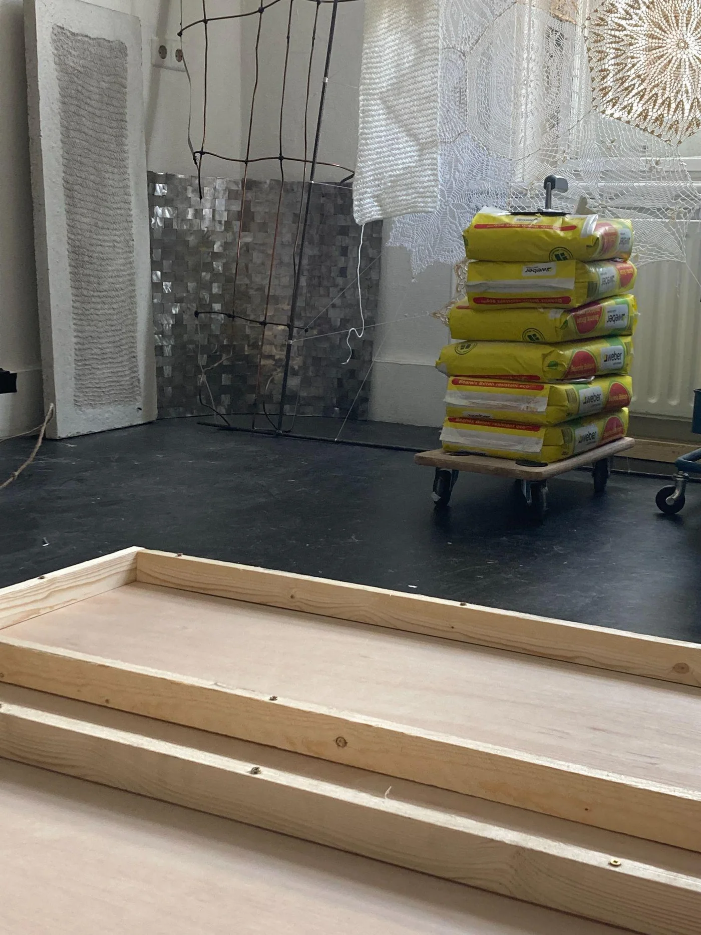 Materials and sculptural structures in a studio space