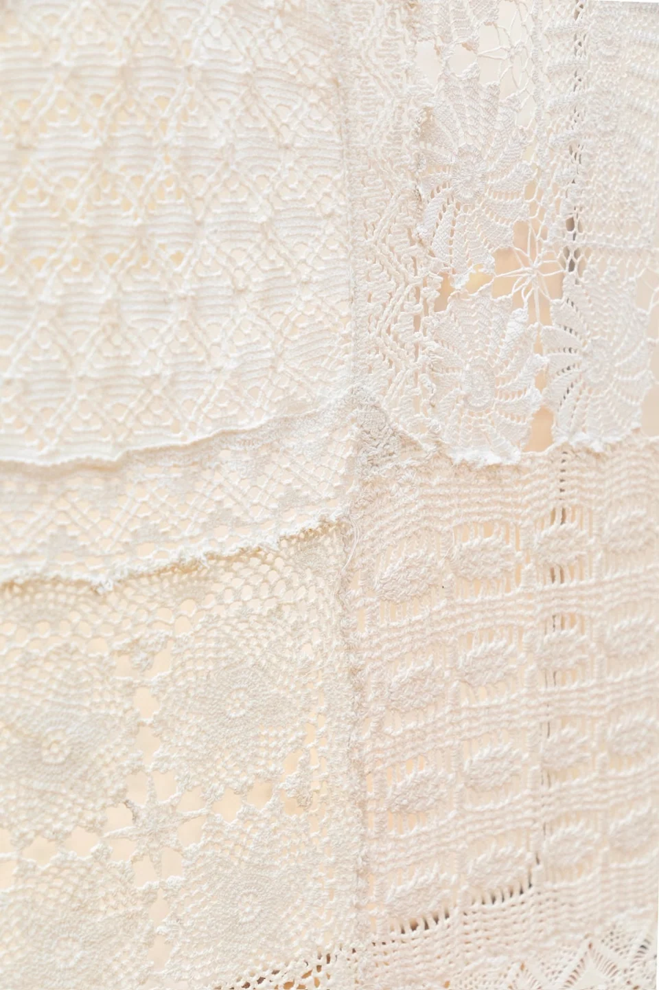 Detail of Hestia showing delicate cream lace and joined Semadaki fabrics