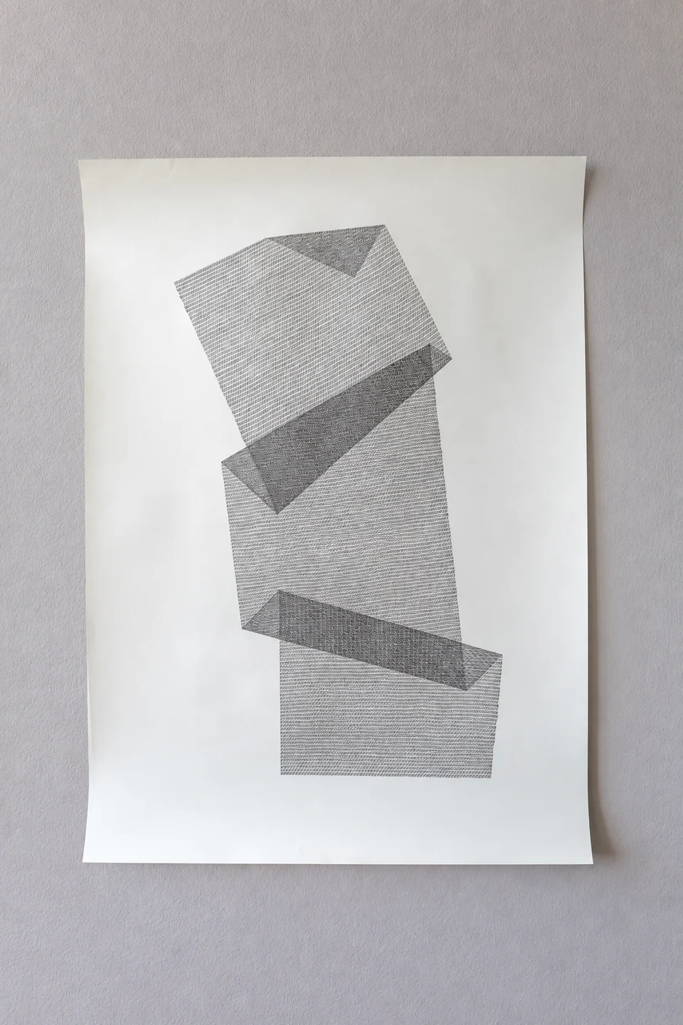 Geometric drawing of folded ribbon-like forms on paper